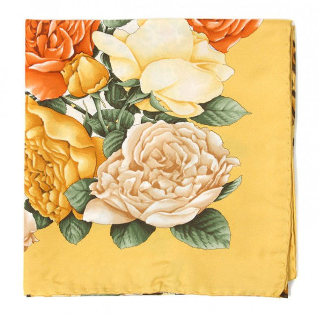A Ferragamo Silk Scarf, 35 x 35 inches.: A Ferragamo Silk Scarf, in a leopard and rose motif. Labeled: Ferragamo. 35 x 35 inches.