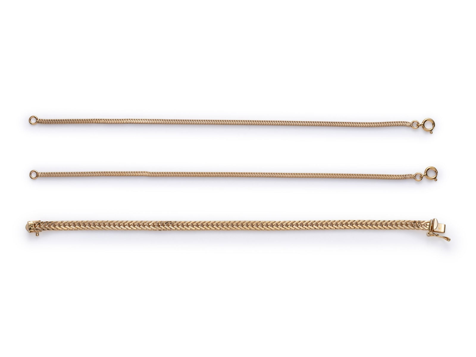 COLLECTION OF YELLOW GOLD BRACELETS (1 of 2)