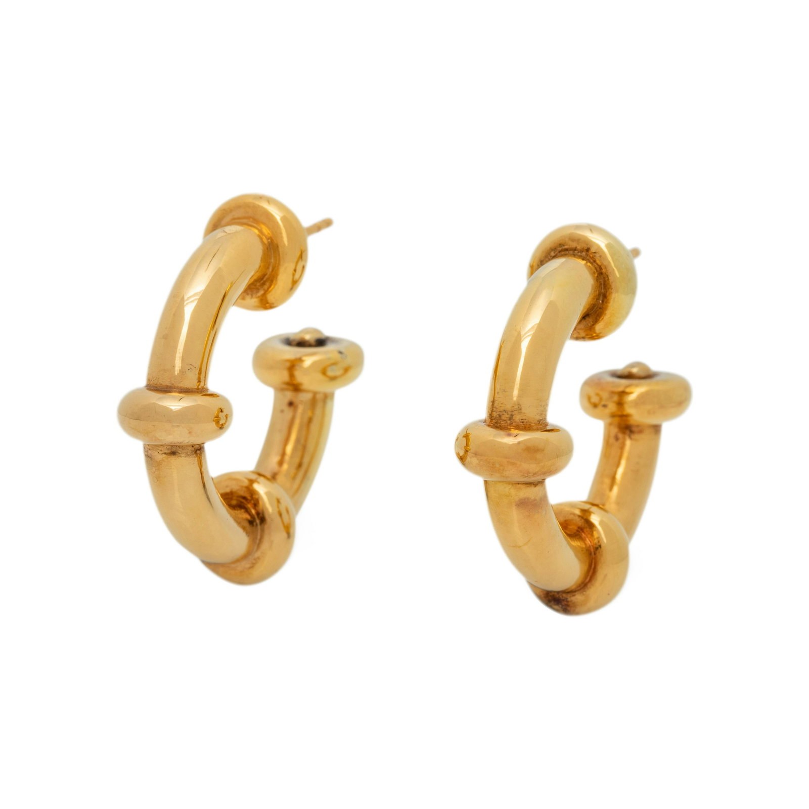 YELLOW GOLD HOOP EARRINGS: YELLOW GOLD HOOP EARRINGS With banded sections. 1 inch long. Stamp: 14kt. 3.85 dwt.