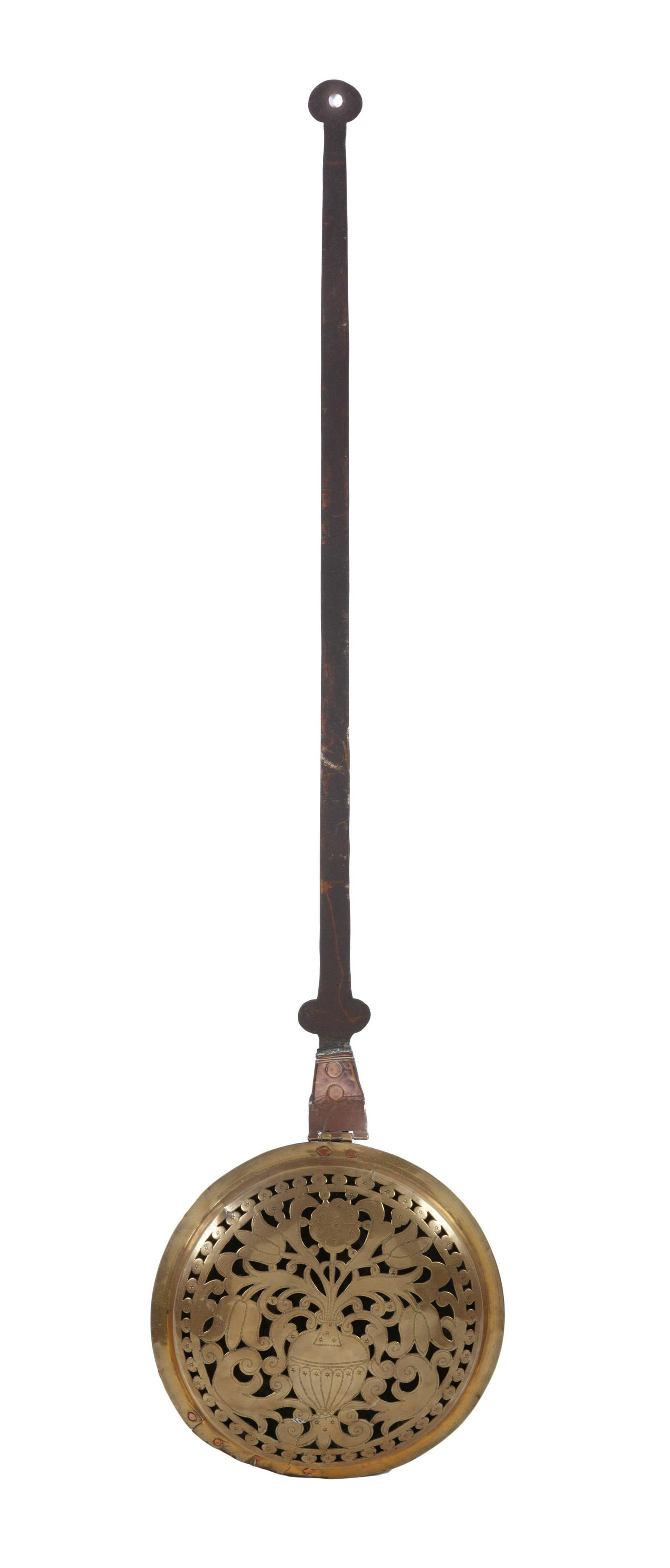 An English Wrought-Iron and Pierced and Engraved Brass: An English Wrought-Iron and Pierced and Engraved Brass Warming Pan Circa 1700 Length 47 1/2 inches. Property from the Estate of Paul Thomas Griffith, Dayton, Ohio Provenance: Sotheby's New York, The A