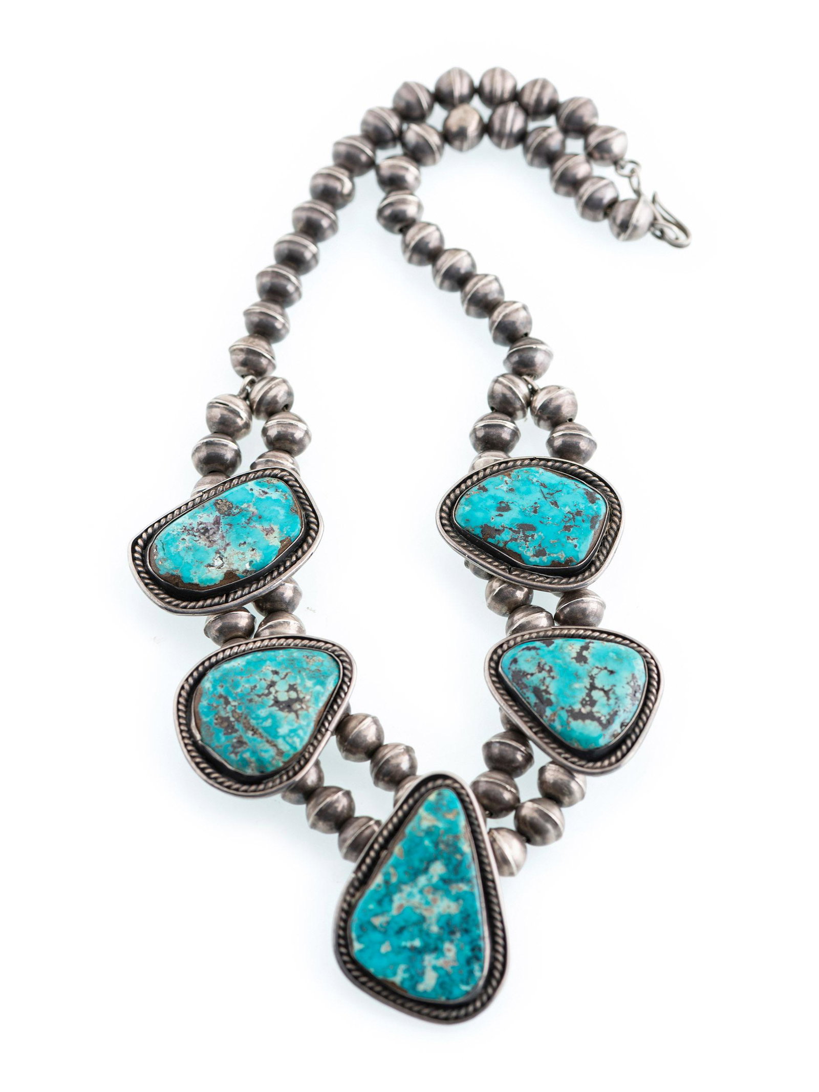 Navajo Silver and Turquoise Choker Necklace: Navajo Silver and Turquoise Choker Necklace third quarter 20th century not marked necklace length 19 inches, weight 92.4 dwt.