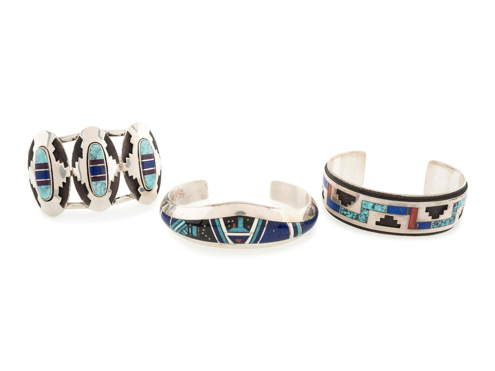 Navajo Silver and Inlay Cuff Bracelets: Navajo Silver and Inlay Cuff Bracelets late 20th century lot of 3, includes: a tapered cuff with lapis, turquoise, jet, shell, and coral mosaic inlay; marked STERLING and signed by Jim Harrison