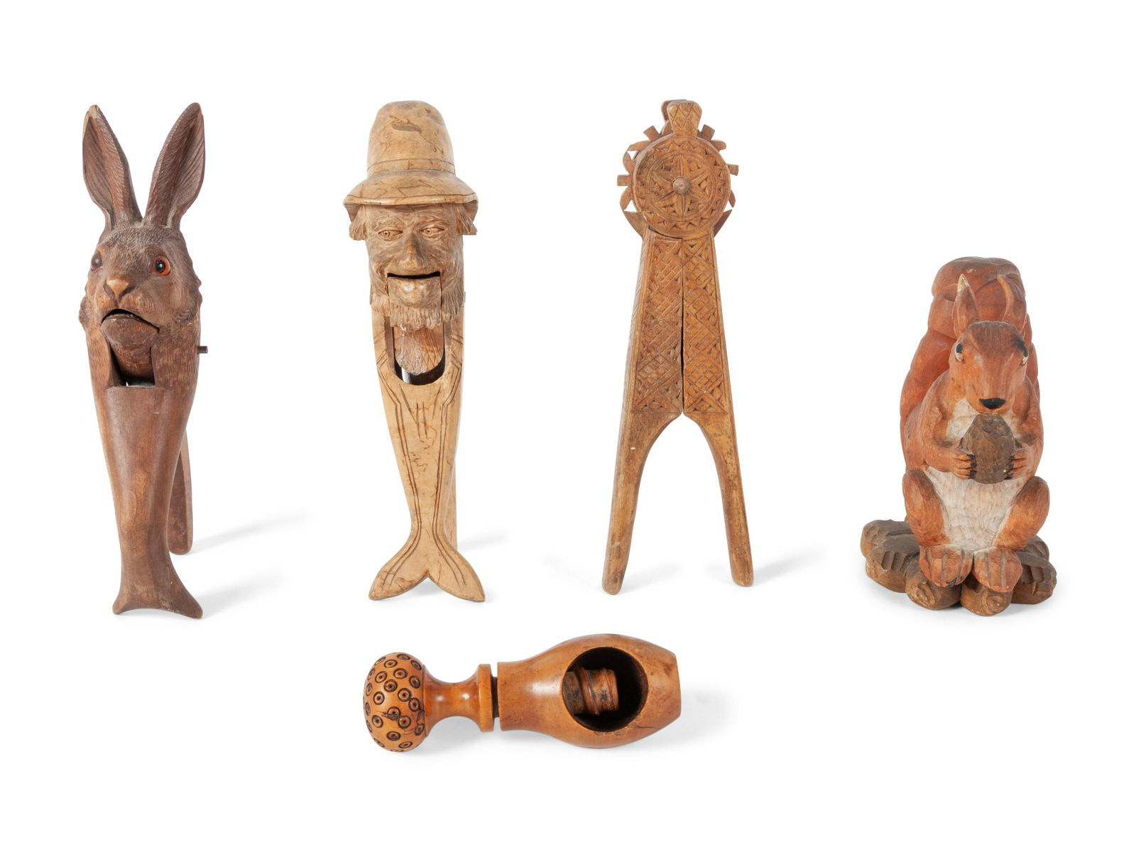 A Collection of Folk Art and Black Forest Carved Nut (1 of 3)