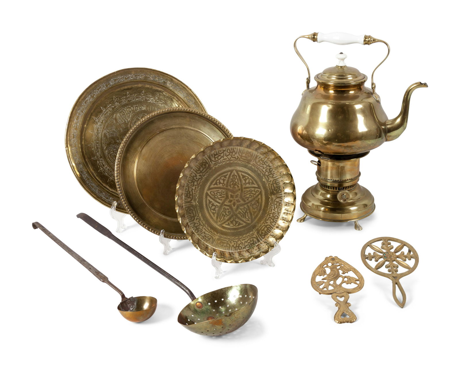 A Collection of Brass Objects comprising of 22 items,: A Collection of Brass Objects comprising of 22 items, including 2 mortar and pestles, 1 electrified lantern, 3 teapots (1 hand hammered and 1 on a kerosene burner), 1 kerosene lamp, 3 trivets, 2 dippe