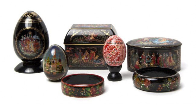 Two Russian Porcelain Boxes, Width of widest 4 1/8: Two Russian Porcelain Boxes, one rectangular, the other oval, together with two papier mache bracelets and three eggs. Width of widest 4 1/8 inches. Property from the Estate of Naomi T. Borwell, Chica