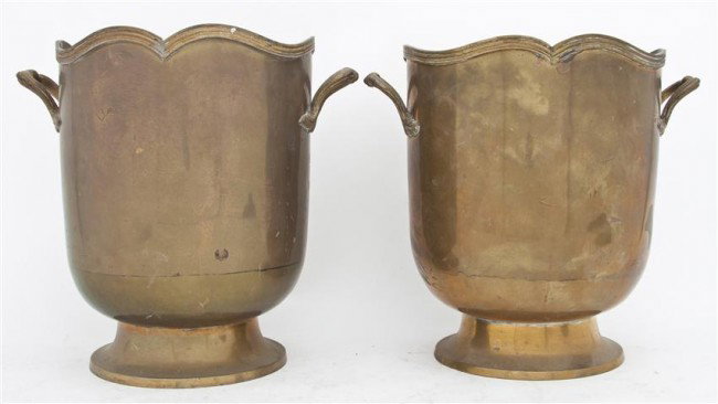 A Pair of Copper Wine Buckets, Height 9 1/4 inches: A Pair of Copper Wine Buckets, each of two handled form raised on a circular foot. Height 9 1/4 inches. Property from the Estate of Medard C. Lange, Chicago, Illinois