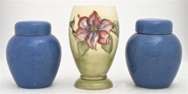 A Group of Three English Ceramic Vessels, Moorcrof: A Group of Three English Ceramic Vessels, Moorcroft, the first a vase of baluster form, with applied floral decoration, the other two a pair of ginger jars. Height of first 7 inches.