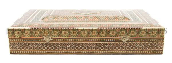 A Middle Eastern Ivory Inlaid Box, Width 17 3/4 in: A Middle Eastern Ivory Inlaid Box, of rectangular form, the stepped lid centered with a diamond form medallion. Width 17 3/4 inches.