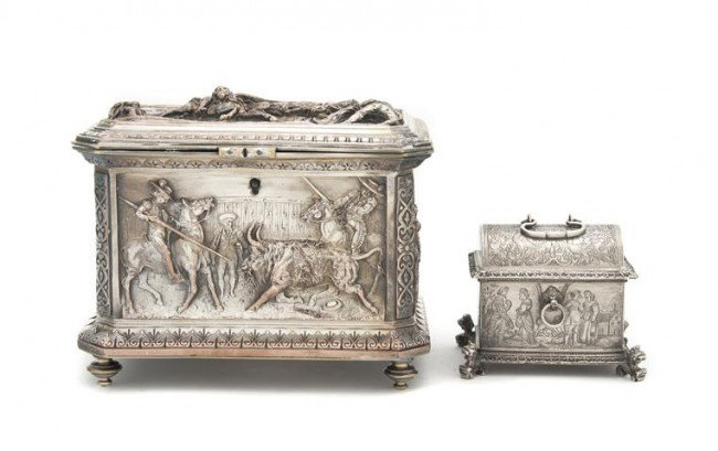A Continental Silverplate Table Casket, Width of f: A Continental Silverplate Table Casket, having a rectangular top with canted corners depicting a bull fight, the frieze with additional bull fight scenes raised on turned legs, together with a smaller