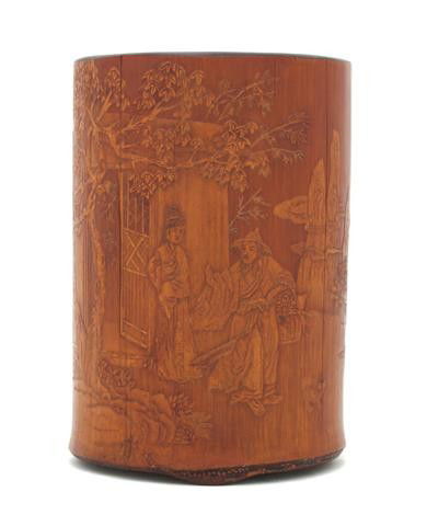 A Bamboo Brush Pot, Height 6 1/2 x diameter 4 1/2: A Bamboo Brush Pot, of cylindrical form, depicting figures in an exterior. Height 6 1/2 x diameter 4 1/2 inches.