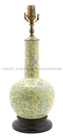 A Chinese Porcelain Vase, Height 11 3/4 inches.: A Chinese Porcelain Vase, of bottle form, decorated with bats and flowers on a yellow ground, mounted as a lamp. Height 11 3/4 inches. Property from the Estate of Anne Scholl, Indian Wells, California
