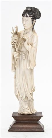 A Chinese Carved Ivory Figure of a Lady, Height 10: A Chinese Carved Ivory Figure of a Lady, depicted holding a branch upon which a parrot is perched, the carved wood base of rectangular form. Height 10 inches.