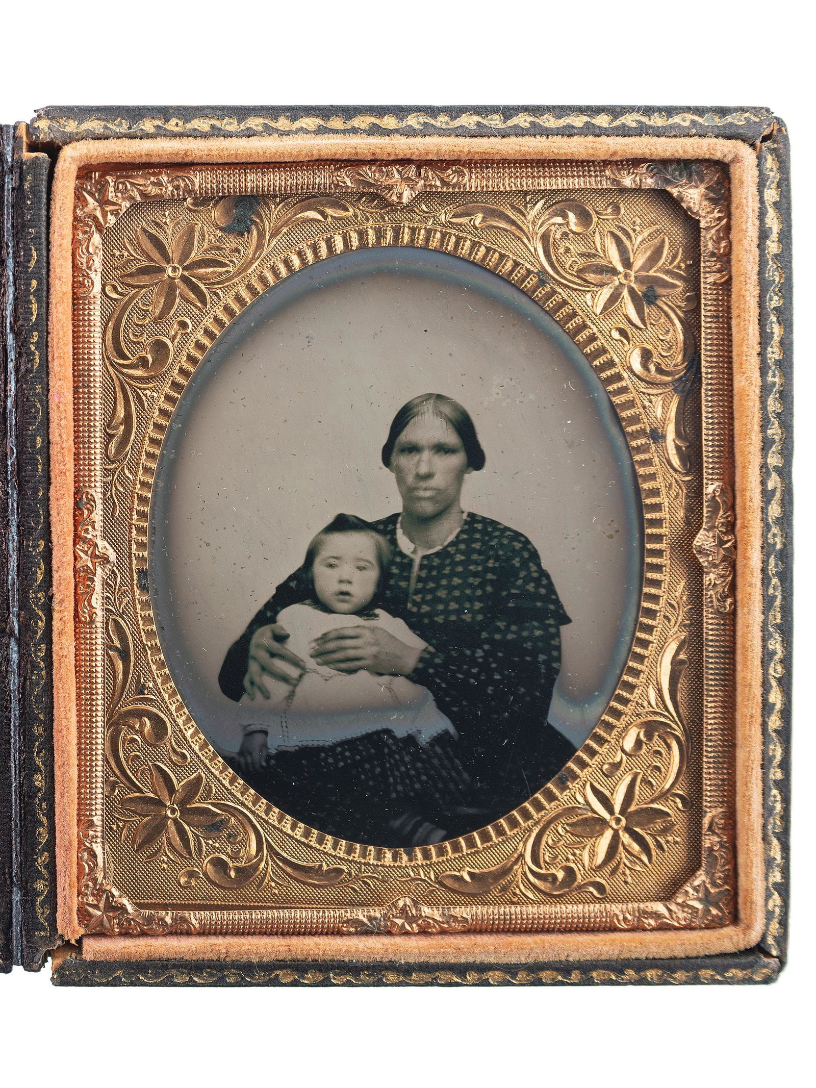 [EARLY PHOTOGRAPHY]. Sixth plate ruby ambrotype of an (1 of 3)