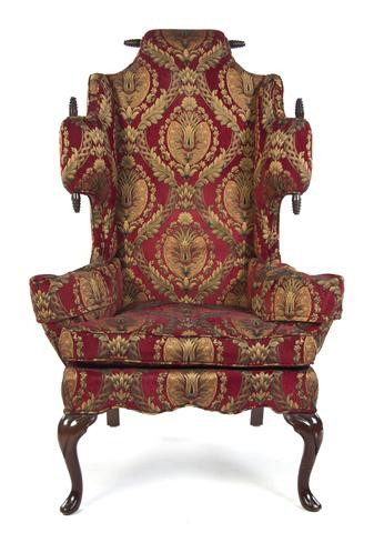 A William and Mary Style Wingback Armchair, Height 5: A William and Mary Style Wingback Armchair, having an upholstered back, arms and seat, mounted with spiral finials, raised on cabriole legs. Height 50 1/2 inches. Property from the Estate of Dr. Werne