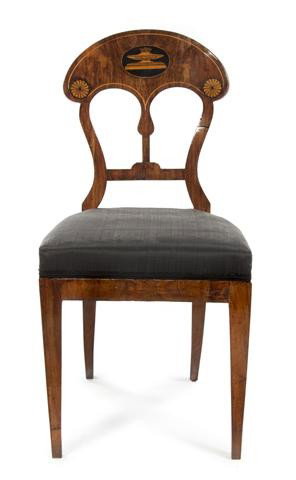 An Austrian Biedermeier Side Chair, Height 35 inch: An Austrian Biedermeier Side Chair, having a shield shaped back with later adaptations and repairs. Height 35 inches.