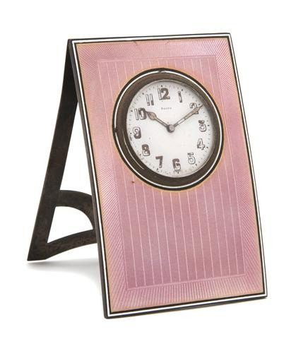 An Enameled Sterling Silver Table Clock, Height 5 : An Enameled Sterling Silver Table Clock, of rectangular form, with circular dial having Arabic numerals and easel stand. Height 5 1/4 inches. Property from the William H. Moore Trust, Hobe Sound, Flor