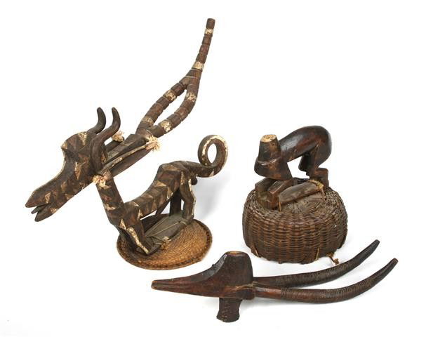 A Group of Two Bambara Tribe Chi Wara Antelope For: A Group of Two Bambara Tribe Chi Wara Antelope Form Headdresses, Mali, both having incised decoration throughout and raised upon a woven basket base, one having incised geometric and polychrome decora