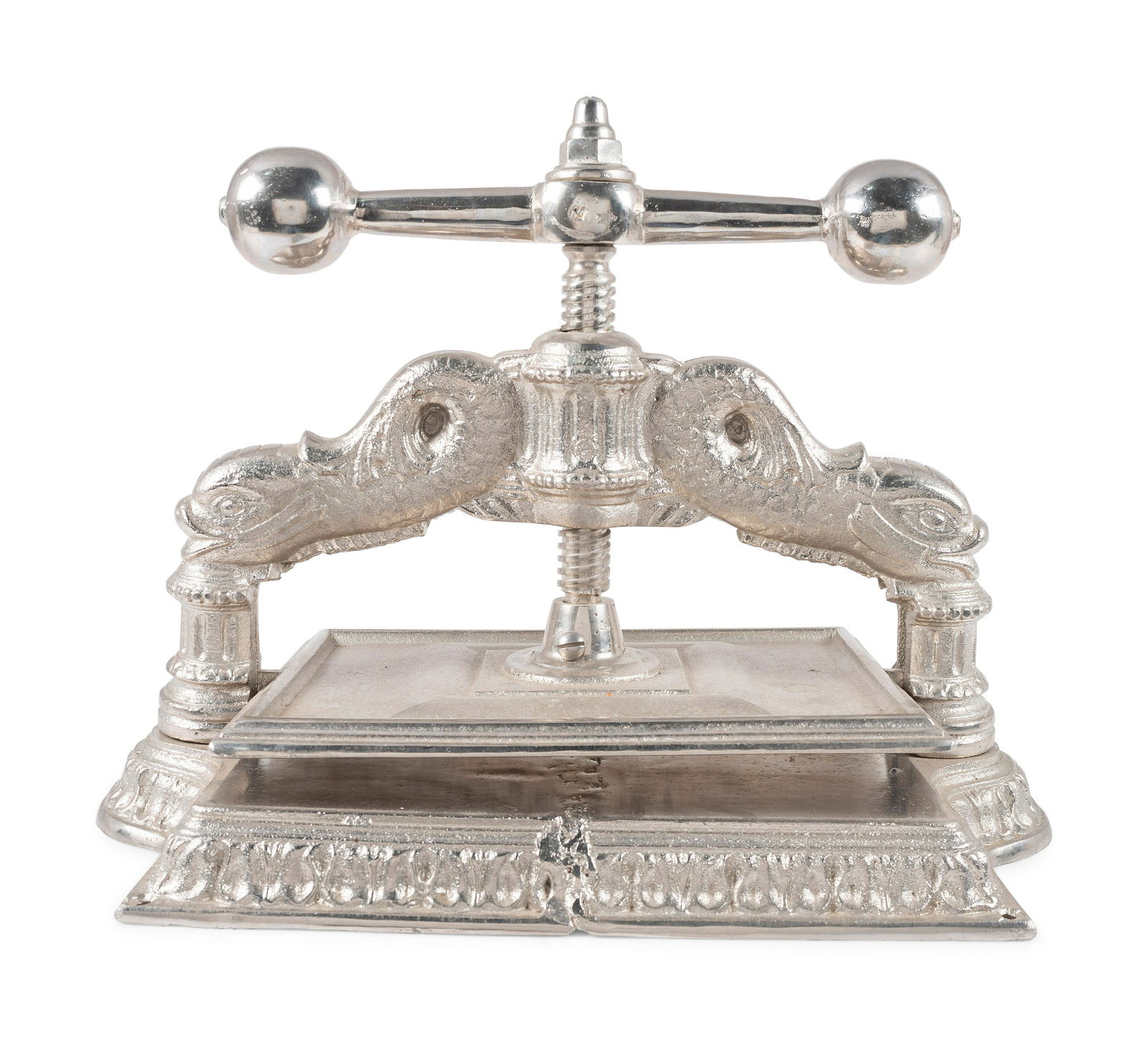 A Dolphin Form Silvered Metal Book Press (1 of 2)