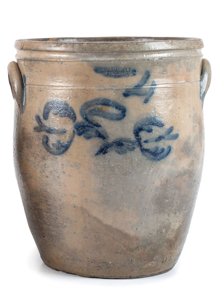 An Ohio Four Gallon Cobalt Decorated Stoneware Crock: An Ohio Four Gallon Cobalt Decorated Stoneware Crock Akron, Ohio, 19th Century stamped for Henry Thomas. Height 13 1/4 inches. Property from the Estate of William D. Giermann, Canal Fulton, Ohio