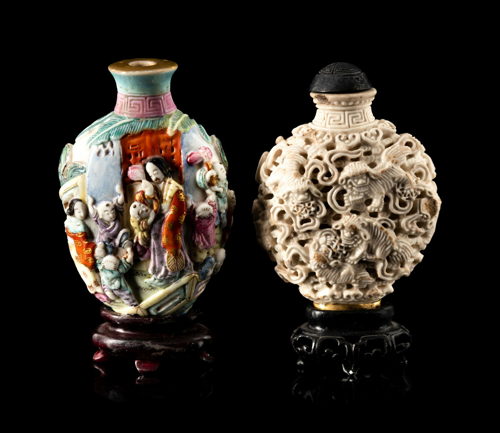 Two Chinese Carved and Molded Porcelain Snuff Bottles Height of taller bottle 3 in., 7.6 cm. (1 of 3)
