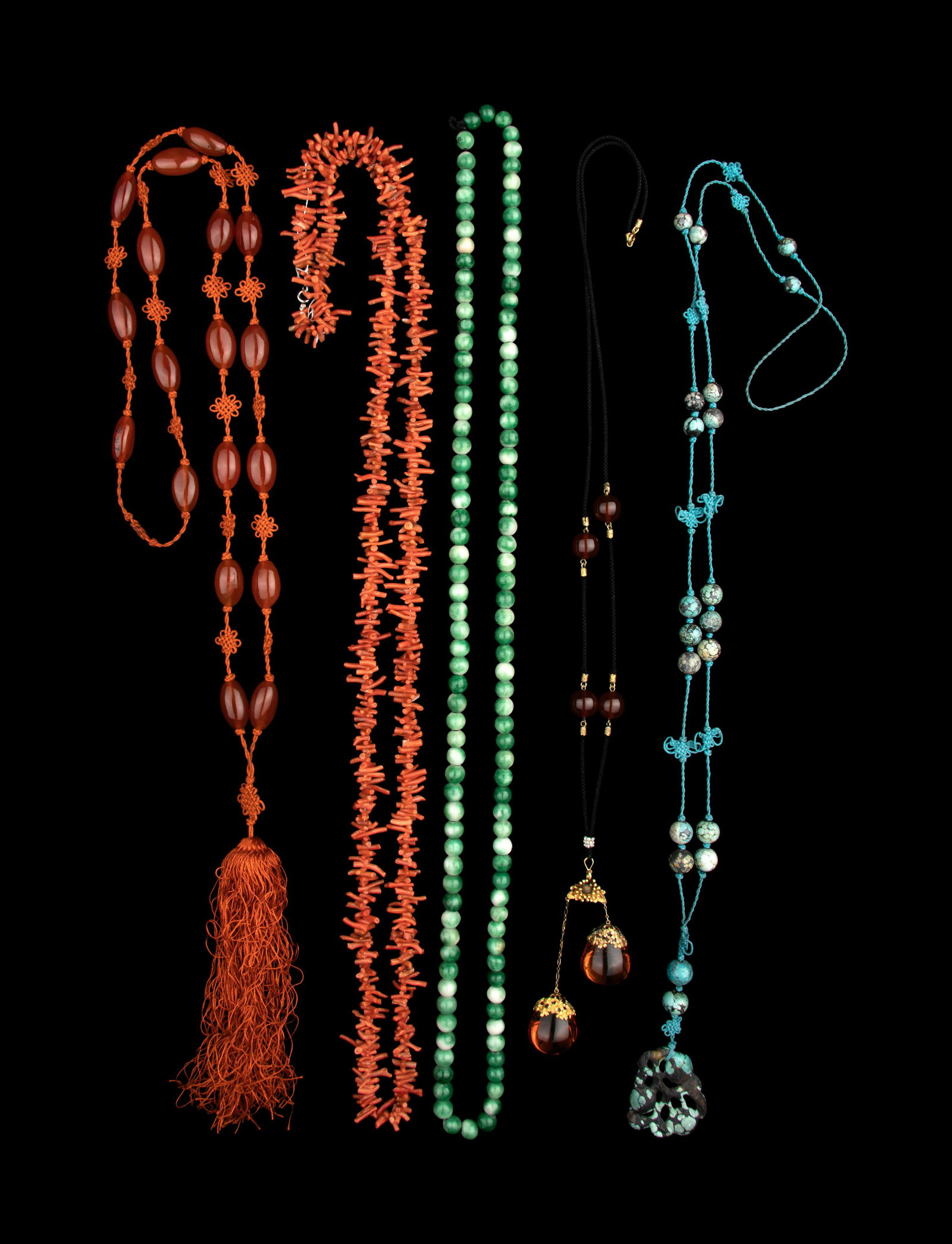 Five Chinese Hardstone and Amber Necklaces Length of longest 37 1/2 in., 95.3 cm. (1 of 3)
