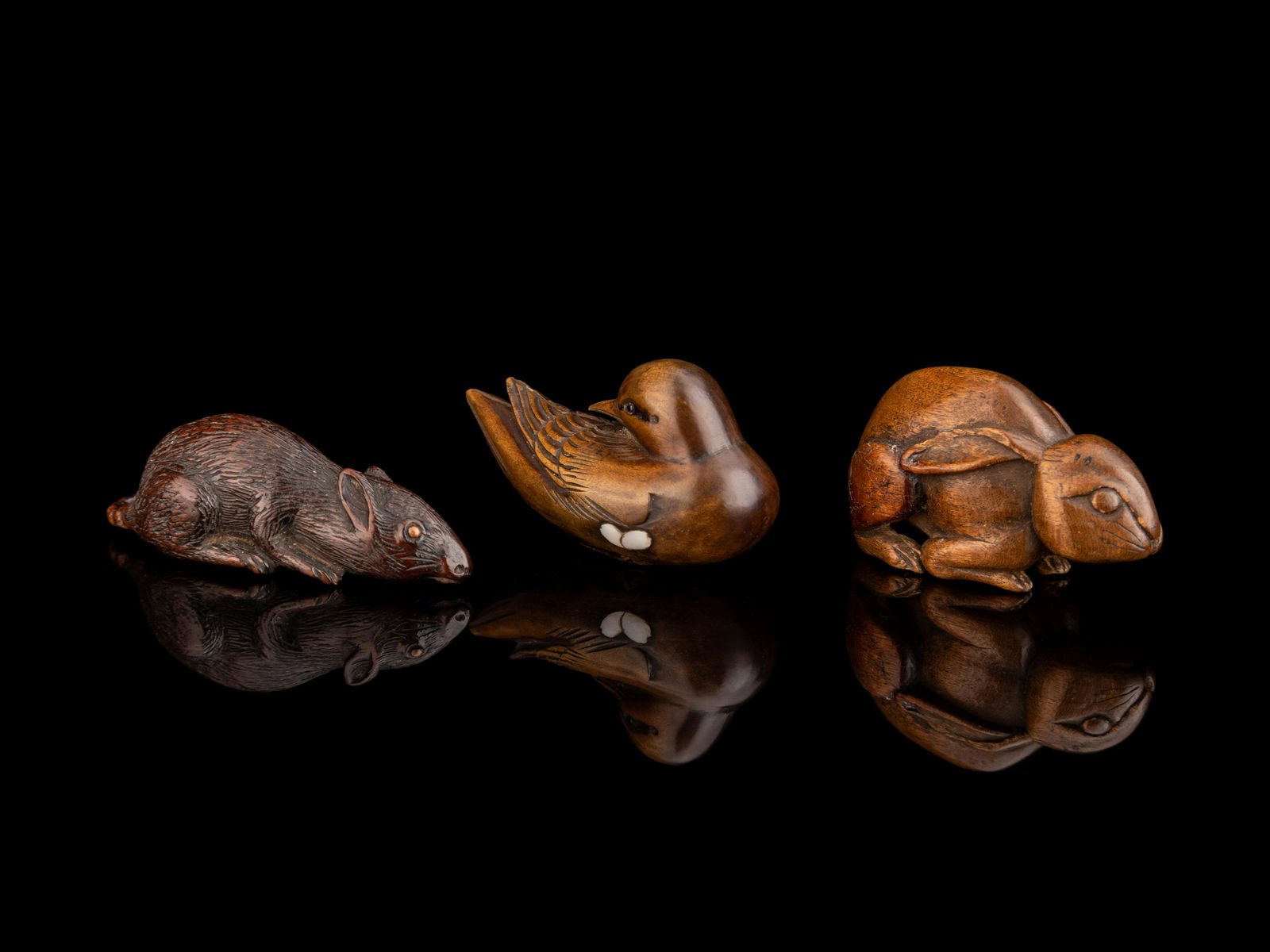 Three Japanese Carved Boxwood Netsuke Length of longest 2 1/4 in., 5.6 cm. (1 of 4)