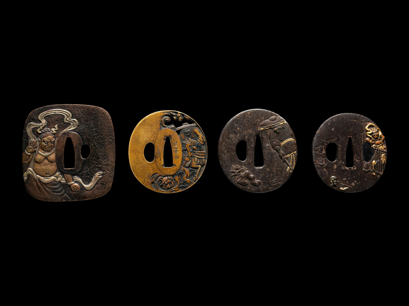 Four Japanese Metal Tsuba Length of the largest: 3 1/2 in., 9 cm. (1 of 4)