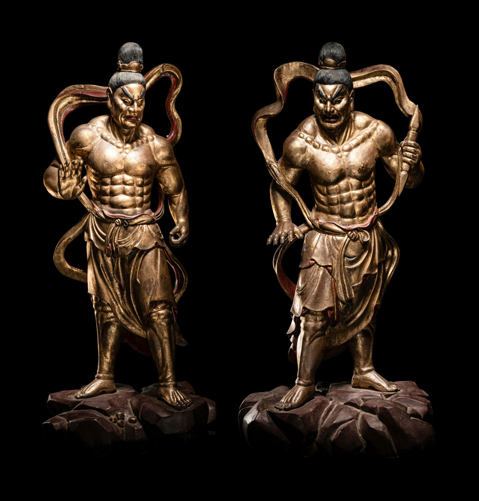 A Pair of Chinese Gilt and Red Lacquered Wood Figures of Wrathful Guardians Height of each 23 in., (1 of 9)