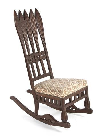 A Floriform Rocking Chair, Height 46 inches.: A Floriform Rocking Chair, having vertical splats over the upholstered seat with brass upholstery tacks. Height 46 inches.