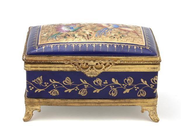 A Limoges Gilt Metal Mounted Jewelry Box, Width 5 : A Limoges Gilt Metal Mounted Jewelry Box, of rectangular form, the lid decorated with exotic birds. Width 5 3/8 inches. Property of a Private Southeast Michigan Collector