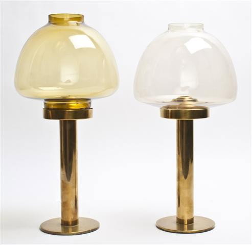 A Set of Six Brass Candlesticks, Height overall 13: A Set of Six Brass Candlesticks, each of columnar form, with a glass shade over the circular foot. Height overall 13 1/4 inches. Property from the William H. Moore Trust, Hobe Sound, Florida