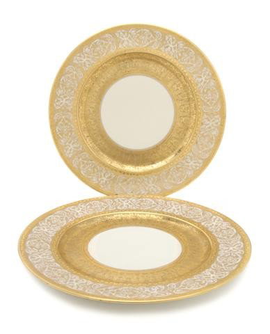 A Set of Six German Porcelain Service Plates, Diam: A Set of Six German Porcelain Service Plates, Heinrich & Co., Bavaria, each with gilt border. Diameter 11 inches. Property from the William H. Moore Trust, Hobe Sound, Florida