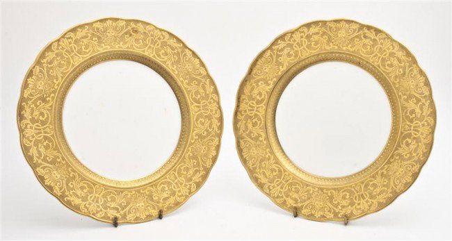 A Set of Twelve English Porcelain Dinner Plates, C: A Set of Twelve English Porcelain Dinner Plates, Crescent, each with a gilt border having foliate and mask decoration. Diameter 10 1/4 inches. Property from the William H. Moore Trust, Hobe Sound, Flo
