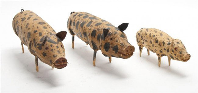 A Group of Three Folk Art Wood Pigs, Carl MacKenzi: A Group of Three Folk Art Wood Pigs, Carl MacKenzie, of graduated sizes, raised on straight legs and having black spots. Length 4 inches. Property from the Collection of Irma Ecksel, Nashville, Tennes
