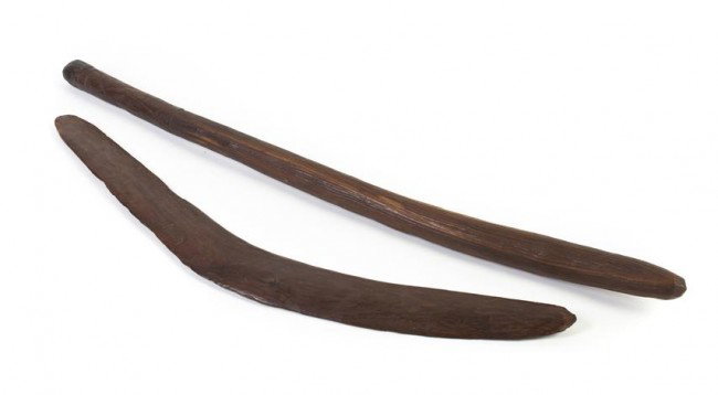 Two Aboriginal Carved Wood Articles, Length of lon: Two Aboriginal Carved Wood Articles, late 19th/early 20th century, comprising a boomerang and a digging stick. Length of longest 26 inches.