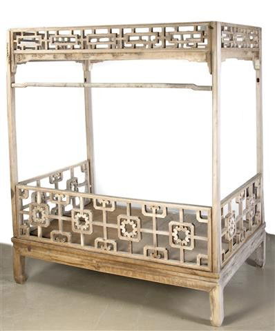 A Chinese Wood Four Poster Bed, Height 84 x width: A Chinese Wood Four Poster Bed, 20th century, having a lattice frame. Height 84 x width 72 x depth 50 inches. Property from the William H. Moore Trust, Hobe Sound, Florida