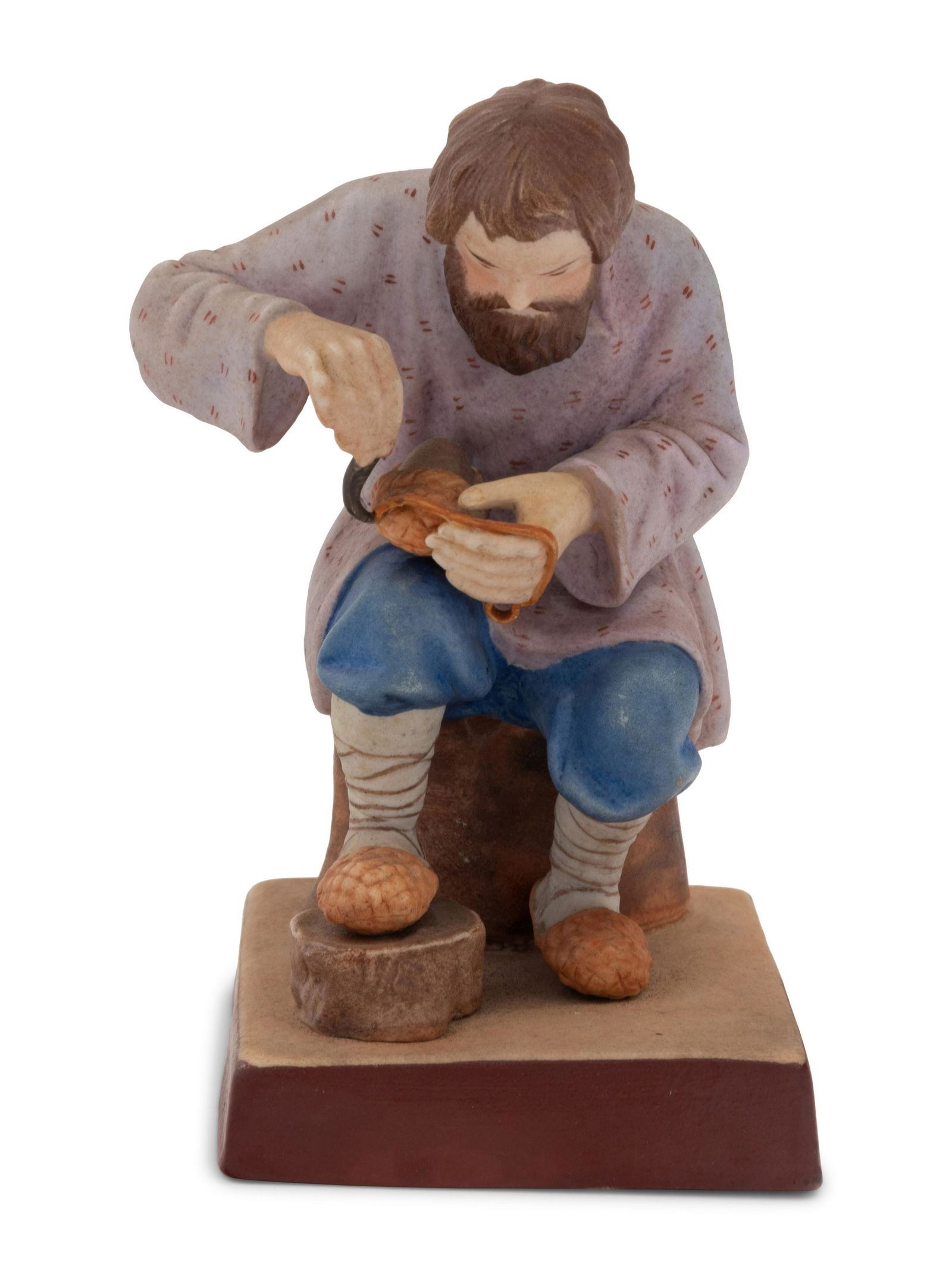 A Russian Porcelain Figure of a Bast Shoe Maker (1 of 3)