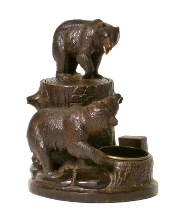 A German Black Forest Carved Wood Humidor, Height 8 3/4: A German Black Forest Carved Wood Humidor, depicting two bears climbing on a tree stump. Height 8 3/4 inches.