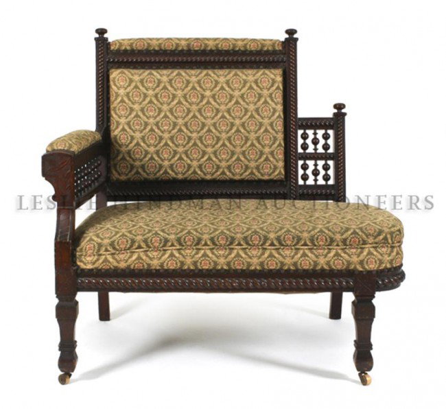 An American Aesthetic Movement Settee, Height 40 x widt: An American Aesthetic Movement Settee, having upholstered back and seat, with overall spindle decoration, raised at the front on tapering legs, terminating in casters. Height 40 x width 27 x depth 26 