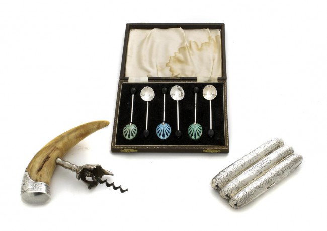 A Collection of Three Silver Articles, Height of first : A Collection of Three Silver Articles, comprising a corkscrew with a boar's tusk handle, an American cigar case, and a box set of six English silver and enamel demitasse spoons. Height of first 5 1/2 