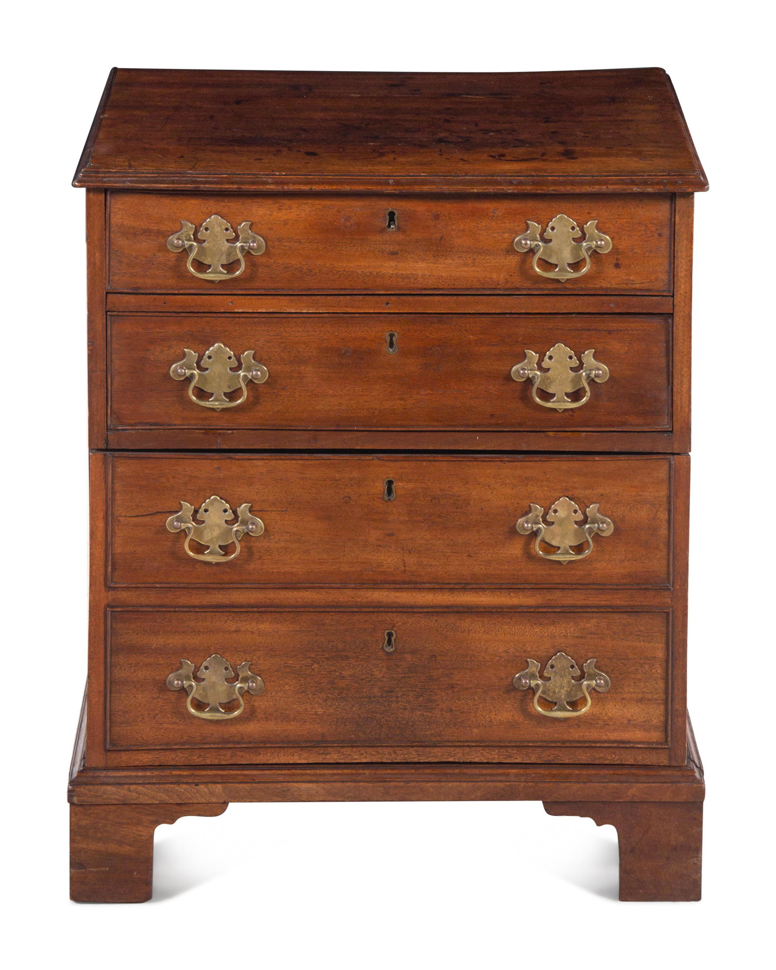 A George III Mahogany Bachelor's Chest: A George III Mahogany Bachelor's Chest Early 19th Century Height 27 1/2 x width 23 1/4 x depth 18 1/4 inches.