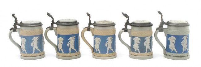 An Assembled Set of Five Ceramic Steins, Villeroy : An Assembled Set of Five Ceramic Steins, Villeroy and Boch, Mettlach, each depicting figures with various implements. Height 6 inches.