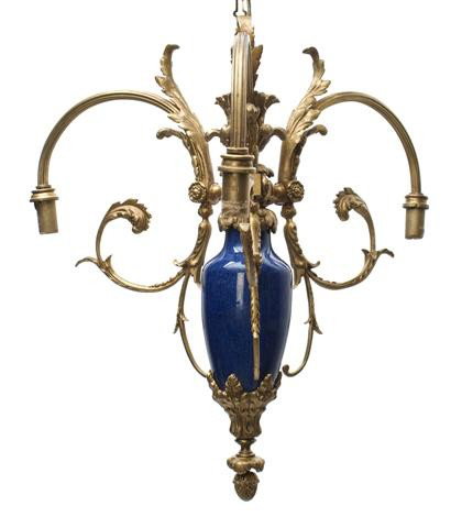 A Sevres Style Gilt Metal Three-Light Fixture, Hei: A Sevres Style Gilt Metal Three-Light Fixture, the cobalt blue standard with pine cone finial issuing three scrolling arms. Height 17 3/4 x width 16 inches.