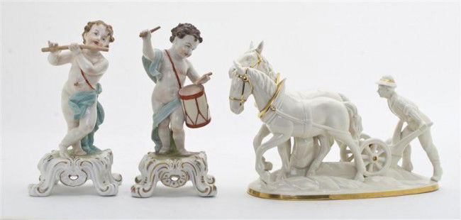 A Group of Three Porcelain Figures, Width of wides: A Group of Three Porcelain Figures, comprising a Dresden figure of a boy with flute, a Capodimonte figure of a boy with a drum and a German porcelain figural group depicting a man with a two horse plo