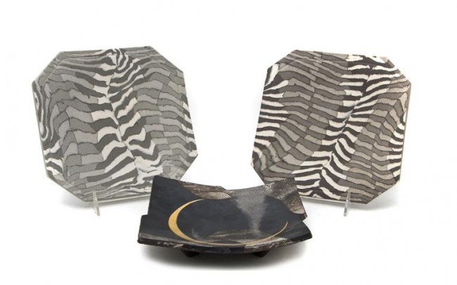 A Set of Eight Studio Ceramic Plates, Susy Siegele: A Set of Eight Studio Ceramic Plates, Susy Siegele, together with an associated trivet. Width of plates 8 1/2 inches.