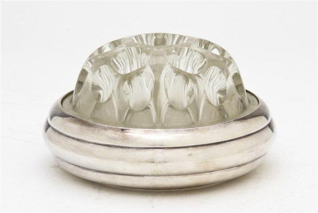 A Glass and Silver Flower Frog, Christofle, Diamet: A Glass and Silver Flower Frog, Christofle, of dome form, set in a silver base. Diameter 4 3/4 inches.