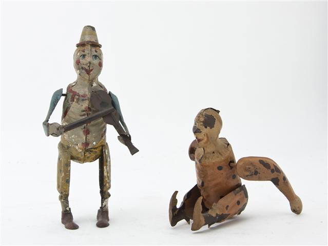 Two German Tin Lithograph Wind-Up Toys, Height of : Two German Tin Lithograph Wind-Up Toys, comprising a clown playing a violin and an acrobat. Height of taller 6 3/4 inches.