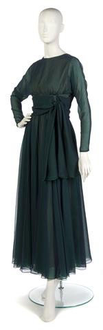 A Geoffrey Beene Blue and Green Chiffon Gown, Size: A Geoffrey Beene Blue and Green Chiffon Gown, with a sash at waist, flowing skirt. Labeled: Geoffrey Beene. Size 8.