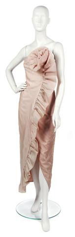 A Nude Silk Evening Gown,: A Nude Silk Evening Gown, probably Bill Blass, with a ruffle detail at strapless neckline cascading down the dress.
