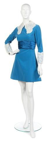 A Bill Blass Blue Velvet Cocktail Dress,: A Bill Blass Blue Velvet Cocktail Dress, 1967, with a white lace collar and cuffs, blue satin belt at waist. Labeled: Bill Blass.